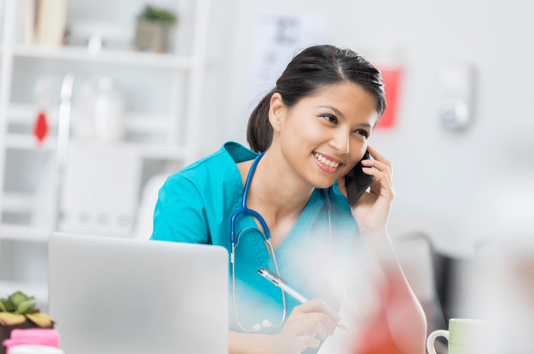 Photo of a health professional talking on the phone, representing poison control number help